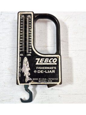 Vintage Zebco Fishermans De-Liar Model 228 Scale & Tape Measure 28 Lbs Black USA
